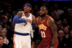 Carmelo Anthony of the New York Knicks and LeBron James of the Cleveland Cavaliers fight for position in the first quarter at Madison Square Garden on December 7, 2016 in New York City.