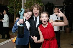 (L-R) Actors Noah Schnapp, Gaten Matarazzo and Millie Bobby Brown attend The Weinstein Company & Netflix's 2017 SAG After Party in partnership with Absolut Elyx at Sunset Tower Hotel on January 29, 2017 in West Hollywood, California. 