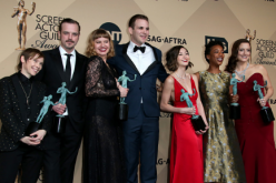  Abigail Savage, James McMenamin, Emily Althaus, Alan Aisenberg, Kimiko Glenn, Samira Wiley, and Julie Lake poses in the press room with their award for Outstanding Performance by an Ensemble in a Comedy Series for 'Orange Is The New Black' at the 23rd An