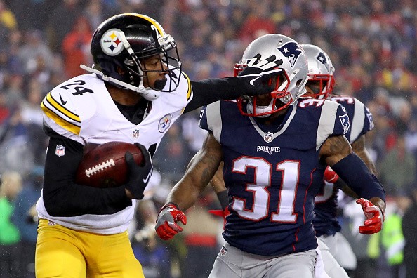 Justin Gilbert defends the ball against the New England Patriots' Jonathan Jones in the first half of the AFC Championship game last Jan. 22.