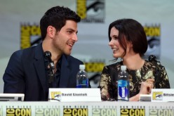 David Giuntoli (L) and Bitsie Tulloch attend the 'Grimm' season four panel during Comic-Con International 2014 at the San Diego Convention Center on July 26, 2014.