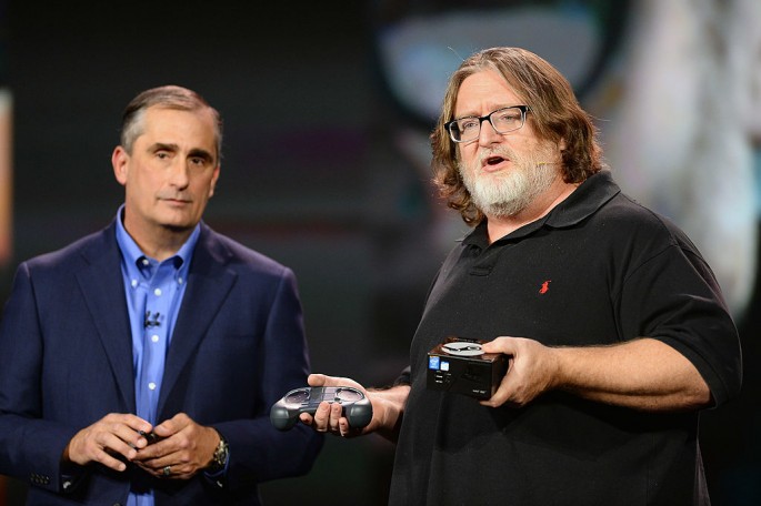 Intel Corp. CEO Brian Krzanich (L) looks on as Gabe Newell, co-founder of video game developer and distributor Valve, speaks during the 2014 International CES on Jan. 6, 2014.