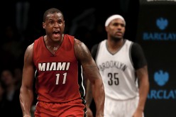 Dion Waiters of the Miami Heat celebrates his shot as Trevor Booker of the Brooklyn Nets defends in the fourth quarter at the Barclays Center on January 25, 2017 in the Brooklyn borough of New York City.