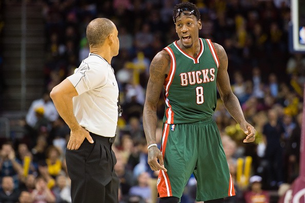 Official Danny Crawford listens to Larry Sanders of the Milwaukee Bucks complain after he was called for a technical foul during the second half against the Cleveland Cavaliers at Quicken Loans Arena on December 2, 2014 in Cleveland, Ohio.