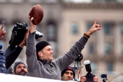 Tom Brady of the New England Patriots celebrates during the Super Bowl victory parade on February 7, 2017 in Boston, Massachusetts.