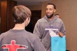 Derrick Williams(second from left) of The Sacramento Kings and a student from The United Nations International School attend an event recognizing New York City students for their efforts to help with the UNICEF Tap Project at Trump SoHo on March 8, 2014 i