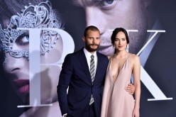Actors Jamie Dornan and Dakota Johnson attend the premiere of Universal Pictures' 'Fifty Shades Darker' at The Theatre at Ace Hotel on February 2, 2017 in Los Angeles, California.