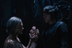 The Major (R) confronts the villain, Kuze, in the live-action adaptation of 'Ghost in the Shell.'