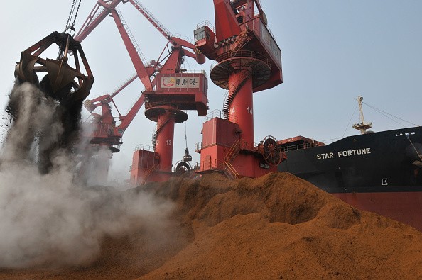 Iron ore from Australia is unloaded at Rizhao Port, one of China's biggest ports for importing the commodity in Shandong Province.