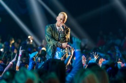 Recording artist Eminem performs onstage at the 2014 MTV Movie Awards at Nokia Theatre L.A. Live on April 13, 2014 in Los Angeles, California.  