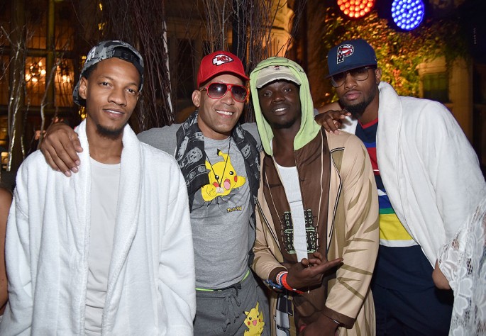  NBA player Paul George (L), Reggie Jackson, and guests attend the annual Midsummer Night's Dream party hosted by Hugh Hefner at The Playboy Mansion