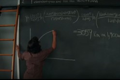 One of NASA's African-American human computer writes a formula on the board. 