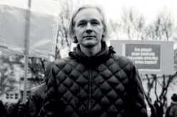 Wikileaks founder, Julian Assange, posed for a picture at a protest during his younger years.