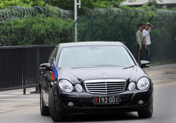 A diplomatic car carrying the Philippines' ambassador leaves the embassy in Beijing.