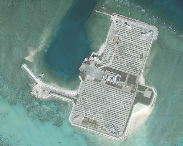 Satellite images show that one of the islands on the South China Sea is being used as a military facility.