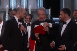 Jimmy Kimmel (L), Warren Beatty and 'La La Land' producer Jordan Horowitz announce 'Moonlight' as correct winner of Best Picture award at the Oscars 2017.