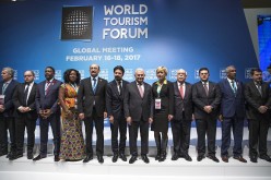 Participants pose for a  photo during the 2017 World Tourism Forum.
