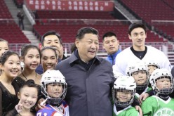 Chinese President Xi Jinping with young winter sports athletes.