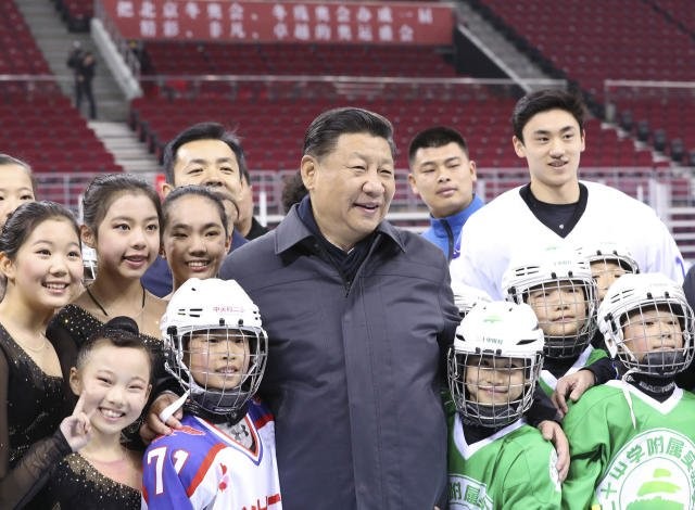 Chinese President Xi Jinping with young winter sports athletes.