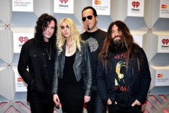 Ben Phillips, Taylor Momsen, Mark Damon and Jamie Perkins of the band The Pretty Reckless attend the 2014 iHeartRadio Music Festival at the MGM Grand Garden Arena on September 19, 2014 in Las Vegas, Nevada. 