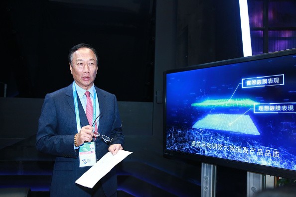 Terry Gou Tai-ming, founder and chairman of Taiwan's Foxconn Technology, speaks at the Foxconn booth during the 3rd World Internet Conference.