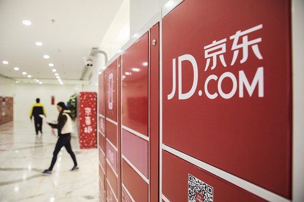 Employees at work in JD.com's headquarters in Beijing. 
