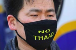 Protesters from South Korea oppose the THAAD.