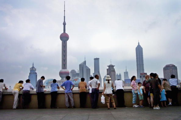 Chinese Tourists Admire Shanghai Skyline