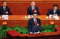 Chinese Premier Li Keqiang delivers his report during the opening session of the National People's Congress at The Great Hall of People on March 5, 2017.