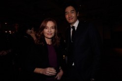 French actress Isabelle Huppert and South Korean actor Yoo Ji-Tae attend the French Night during the 16th Busan International Film Festival (BIFF) at Novotel on October 8, 2011 in Busan, South Korea.
