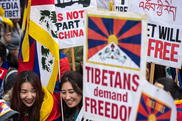 Supporters worldwide march to commemorate the Tibetan rebellion.