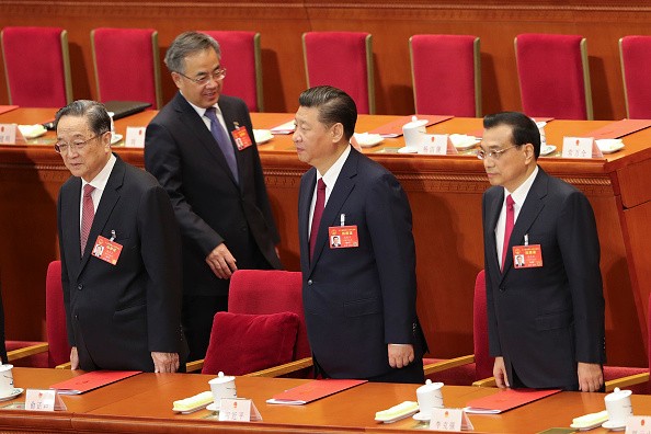 Chinese President Xi Jinping, Premier Li Keqiang and Yu Zhengsheng attend the closing meeting of the Fifth Session of the 12th National People's Congress.