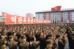 North Korean soldiers praise the successful nuclear arms testing.