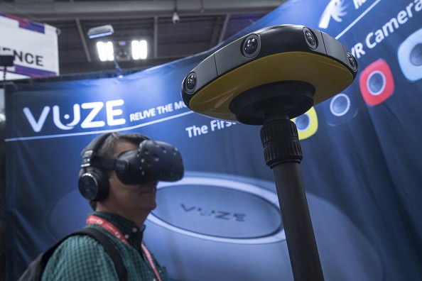 An attendee wears a HTC Vive virtual reality headset (VR) as he views data from a Vuze 360 degree camera at the 2017 South By Southwest (SXSW) Interactive Festival.