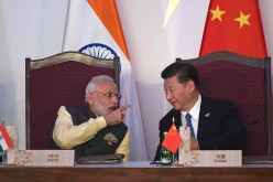 China thinks that the country should not get involved in the India-Pakistan dispute on Kashmir.