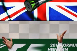 Lewis Hamilton of Mercedes GP celebrates his Grand Prix of China win on the podium.
