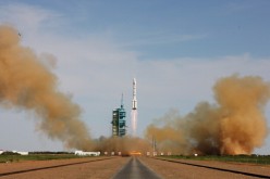 The Long March-2F rocket blasts off from the launch pad at the Jiuquan Satellite Launch Center on June 11, 2013, in Jiuquan, Gansu Province, China.