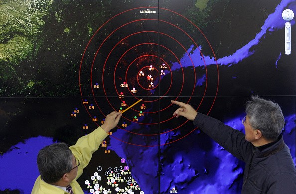 South Korean officials point to the screen to show seismic waves from North Korea at the Korea Meteorological Administration center on Jan. 6, 2016, in Seoul, South Korea. 