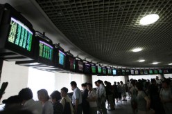 Investors gather to view the stock index at a securities company on May 30, 2007 in Nanjing, China.