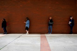 People who lost their jobs wait in line to file for unemployment benefits, following an outbreak of the coronavirus disease (COVID-19),