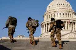 Members of the National Guard patrol at the U.S. Capitol after police warned that a militia group might try to attack the U.S. Capitol in Washington, U.S.