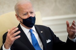 U.S. President Joe Biden speaks to the press before a bipartisan meeting on cancer legislation in the Oval Office at the White House in Washington,