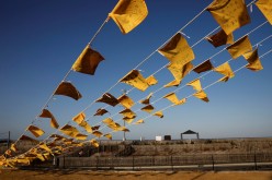 Yellow handkerchiefs bearing messages supporting people in areas hit by the 2011 earthquake and tsunami are hanged at Iwaki 3.11