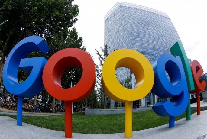 The brand logo of Alphabet Inc's Google is seen outside its office in Beijing, 