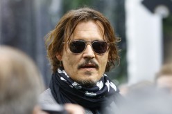 Actor Johnny Depp talks to the media before a screening of the documentary movie he produced: 