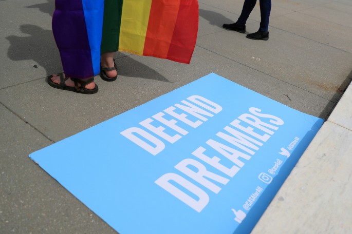 A sign in support of DACA Dreamers lies at the steps of the U.S. Supreme Court after the court 