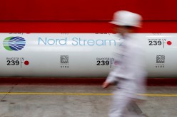 The logo of the Nord Stream 2 gas pipeline project is seen on a pipe at Chelyabinsk pipe rolling plant owned 