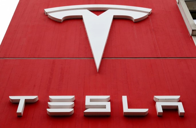 The logo of car manufacturer Tesla is seen at a branch office in Bern, Switzerland 