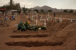 Fresh dug graves are pictured at El Centinela cemetery, amid the coronavirus disease (COVID-19) pandemic, in Mexicali, Mexico