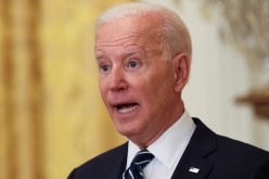 U.S. President Joe Biden answers a question as he holds his first formal news conference as president in the East Room of the White House in Washington, U.S